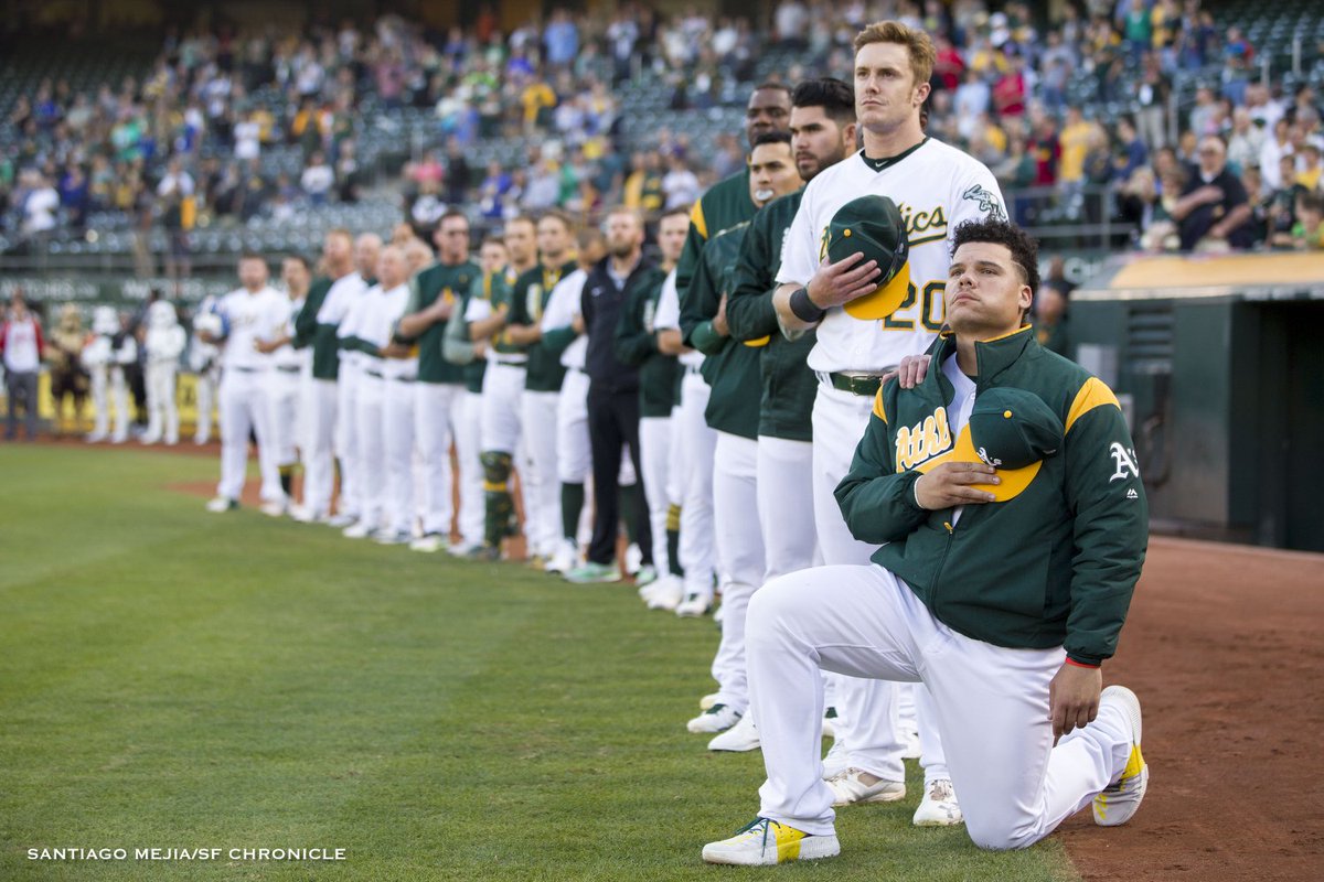 A’s Bruce Maxwell just took a knee during anthem. He is the first in #MLB to do it. @sfchronicle @SFGate #baseball #Oakland #athletics