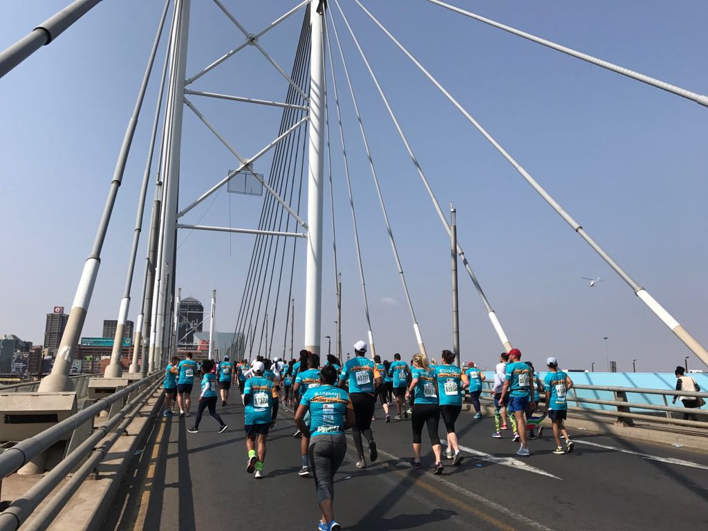 joburg10k's tweet photo. The iconic Nelson Mandela bridge. Means you're nearly home! #J10KRun #ExploreYourCity #RunYourCitySeries #HeritageDay https://t.co/ztLodIkQCr