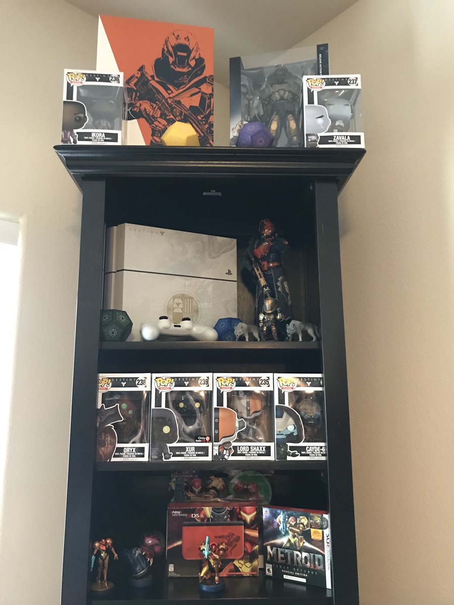 CommunityOpsSM's tweet image. Put some of the @DestinyTheGame collectibles out but have so much more may need to buy a new shelf...lol. #destiny