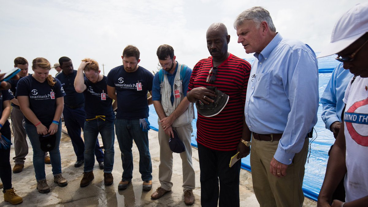 Franklin_Graham's tweet photo. .@LibertyU students tarping the roof of a church in Barbuda today. What an incredible group of young people. Believe me, It's hot out here! https://t.co/bv74Zct0Mz