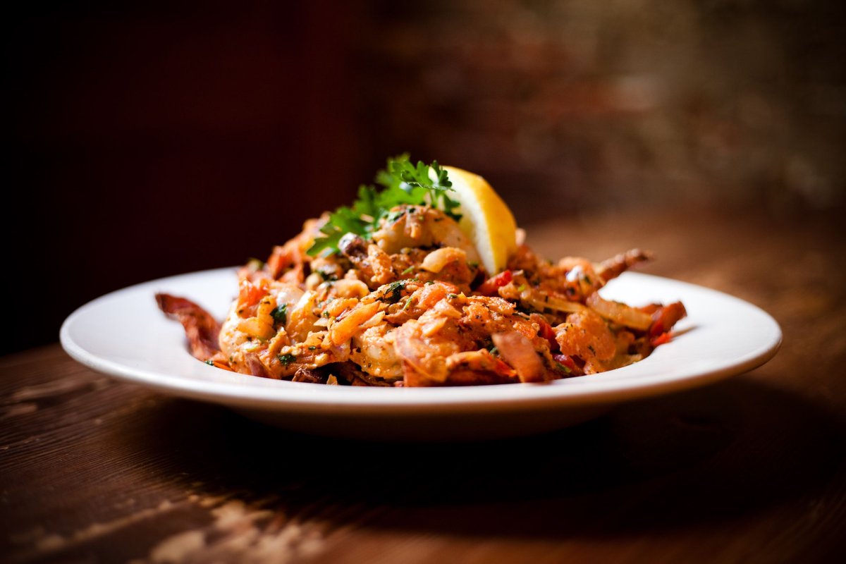 Come warm up with a #Canadian plate of deliciousness, poutine. Chicago fries topped with pulled pork, cheese curds &amp; rosemary whiskey gravy!