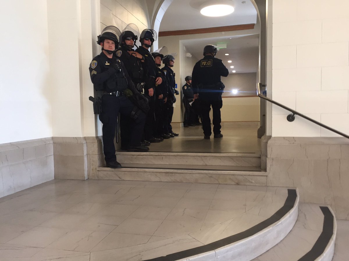 Fire alarms on at Wheeler Hall. Police barricading door to prevent Occupation. <a href="/berkeleyside/">Berkeleyside</a>