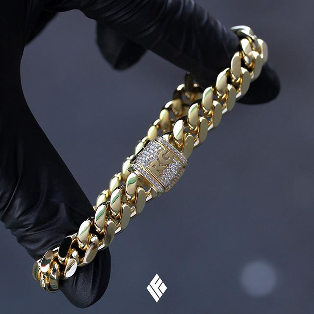 ifandco's tweet photo. Solid 14K Yellow Gold 9mm Cuban Link Bracelet Partially Iced "RG" Clasp. Custom made for @conr 💎 #CubanLink #CustomJ... https://t.co/NCps4Y6KYt