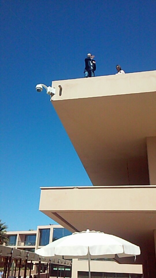 Michelle12Will's tweet photo. Its a hard job being a #GWS2017 organizer coordinating everyone for a rooftop photo Op https://t.co/RwKPZzbU2S