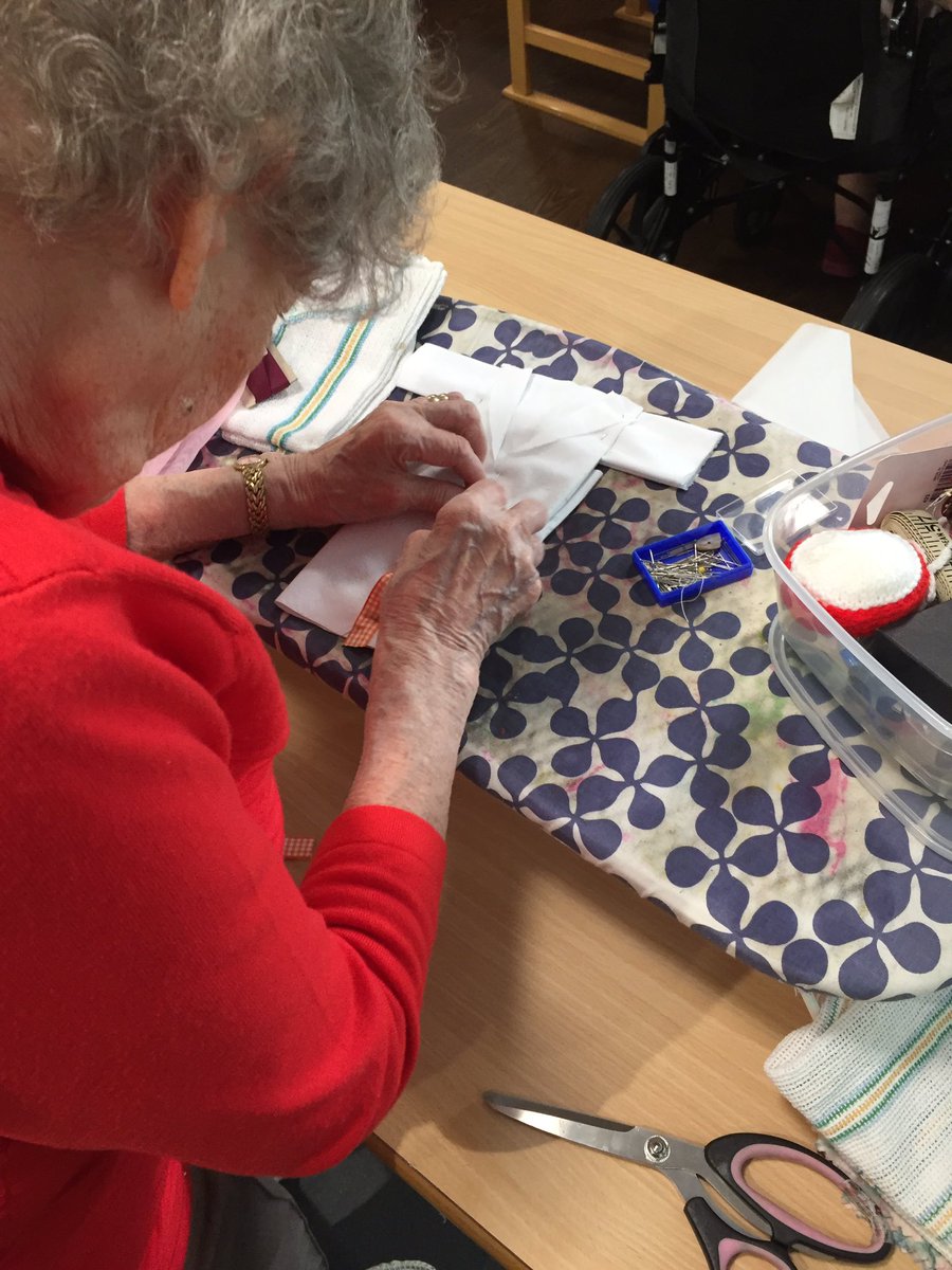 Busy day <a href="/NorthbourneCare/">Northbourne care home</a> transforming paper miniature clothes into fabric #workinthecottonmills #dressmakers #olderpeople