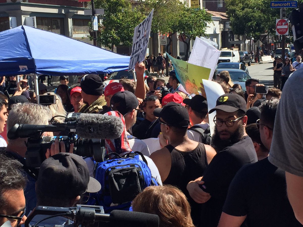 Incoherent screaming. "No Trump, no hate, no fascist USA!"  Impossible to hear other side's chants.  Tiny groups yelling. <a href="/berkeleyside/">Berkeleyside</a>