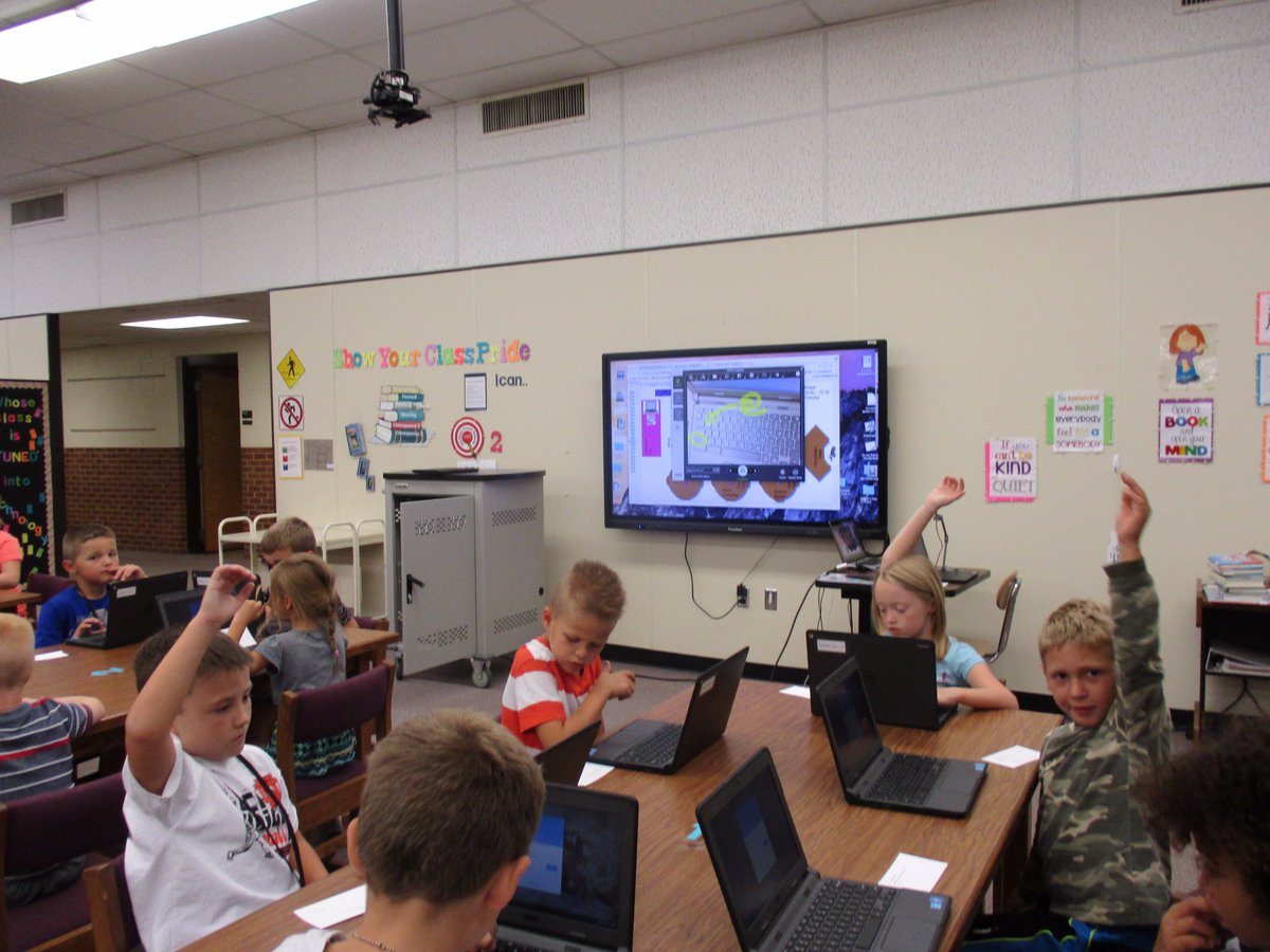 Second graders working on 21st Century Skills in the library.        
<a href="/dcsnc/">@DCSNC</a> <a href="/sedley1/">SEDLEY</a>