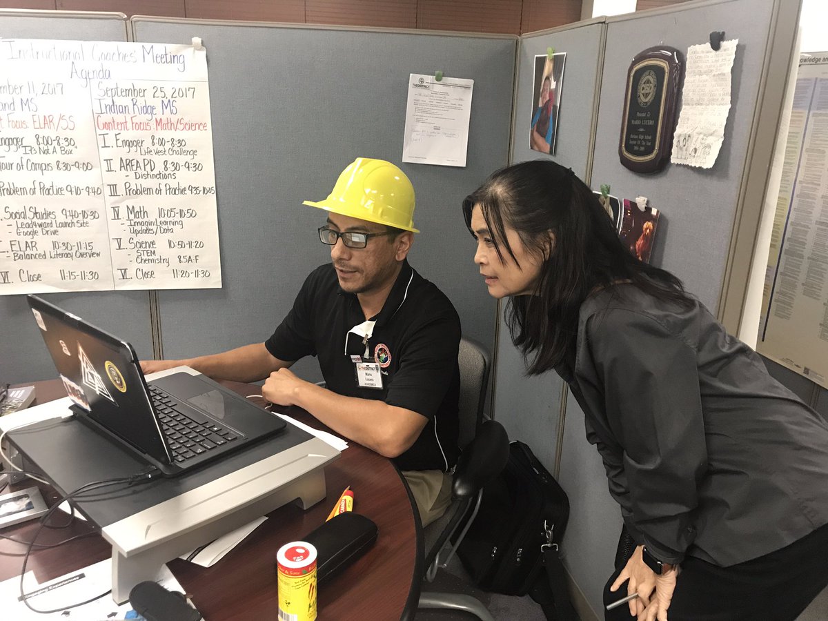 Mario Lucero wearing his thinking cap & swapping strategies with Stella Woo, in preparation of early release! #teammiddleschool #THEDISTRICT