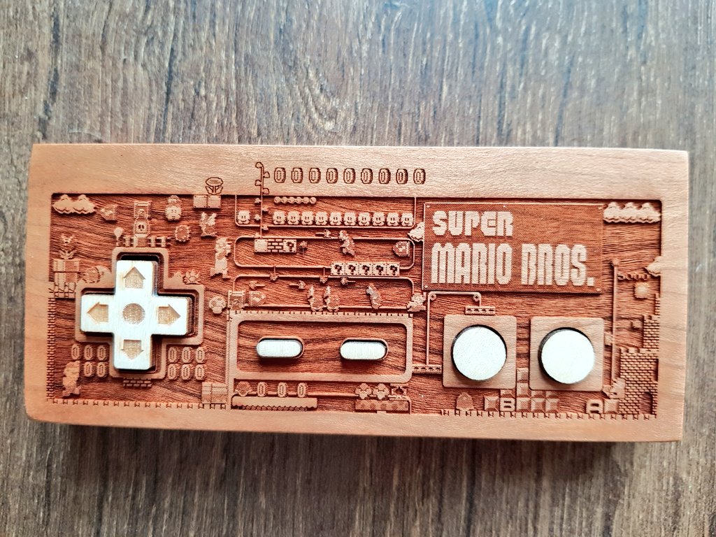 kingmonkey25's tweet photo. It's #WedNESday so thought I'd share my awesome #SuperMarioBros laser-etched #NES controller by @SpitFire_Labs 😁 #Nintendo #retrogaming https://t.co/Yv9b7jFny5