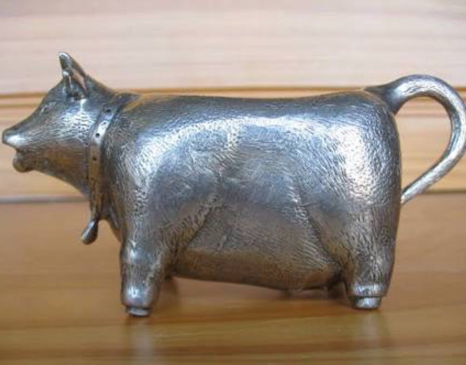 HowNowDownCow's tweet photo. Some of these silver cow creamers are in better body condition than others! #MilkTrivia https://t.co/2WkxTrjH9S