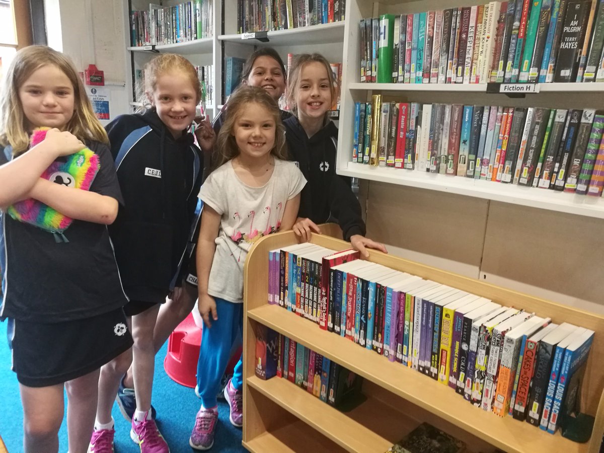 DunLibrary's tweet image. Great excitement from Grp 2 as our new bookshelf arrived to display all the lovely FREE books we got from our Book Fair.