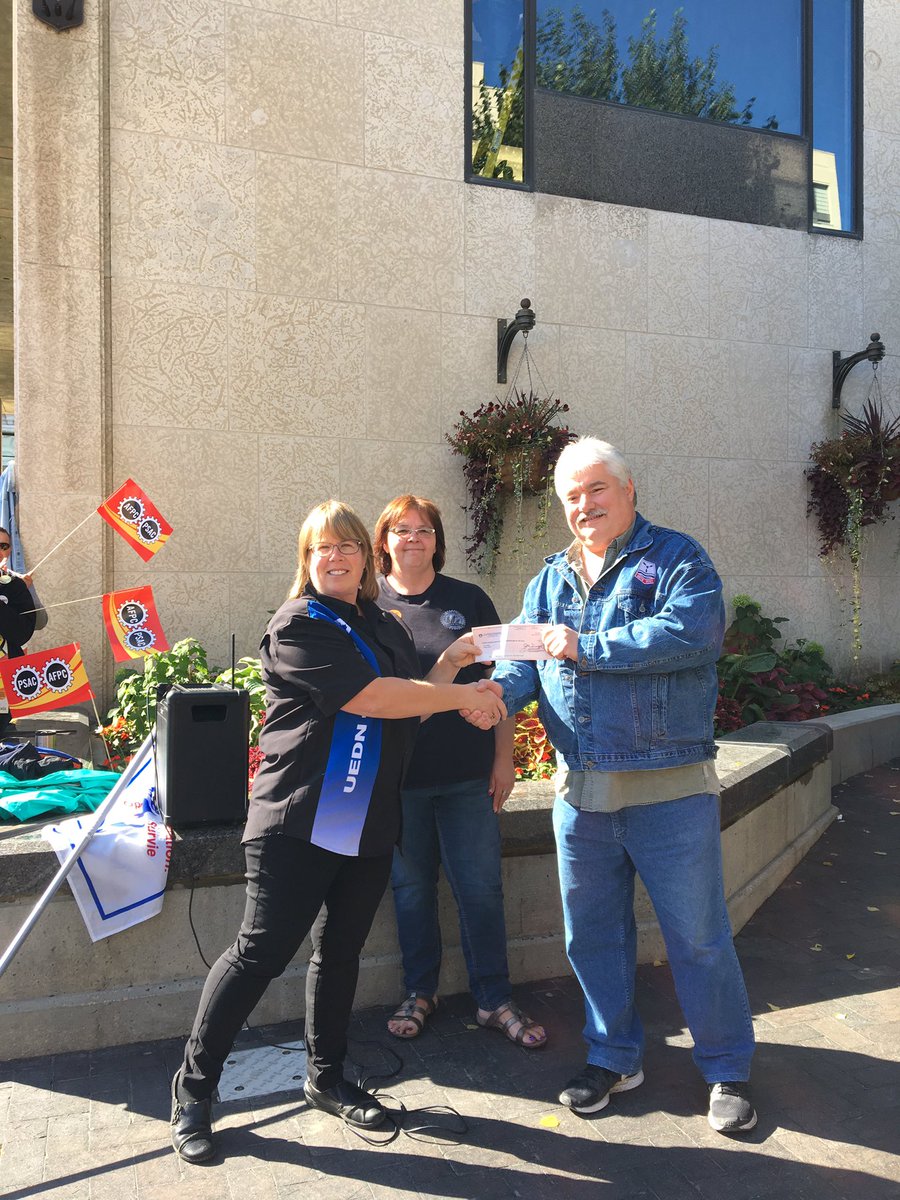 Proud to present a cheque for $11,817.50 on behalf of UNDE at solidarity rally today in support of PSAC/UCTE 50600 on strike since July 24.