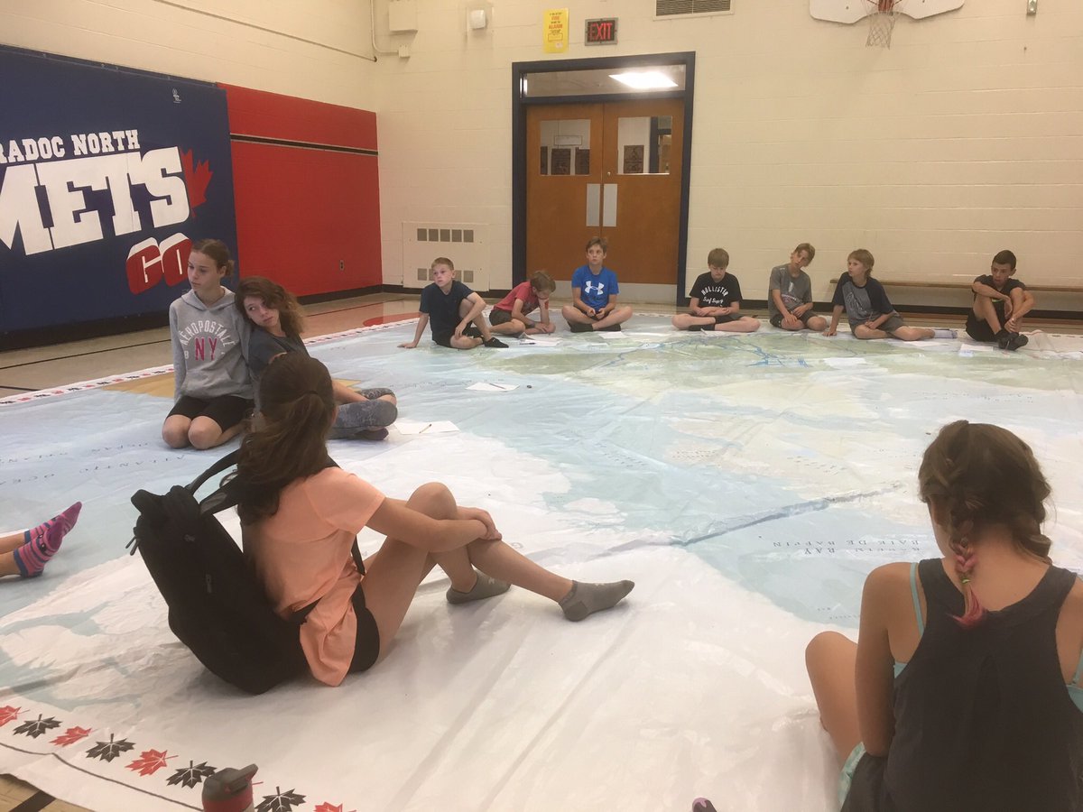 Grade 6/7 students engaged in learning about Canada's energy production and transmission