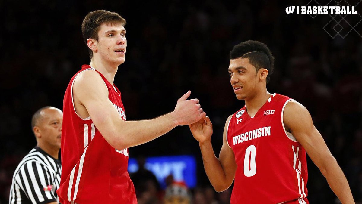BadgerMBB's tweet photo. It’s almost hoops season... 🏀🕖

Proud to have Ethan Happ and D’Mitrik Trice represent the #Badgers in NYC at Big Ten Media Day on Oct. 19. https://t.co/sQPk8ComhV