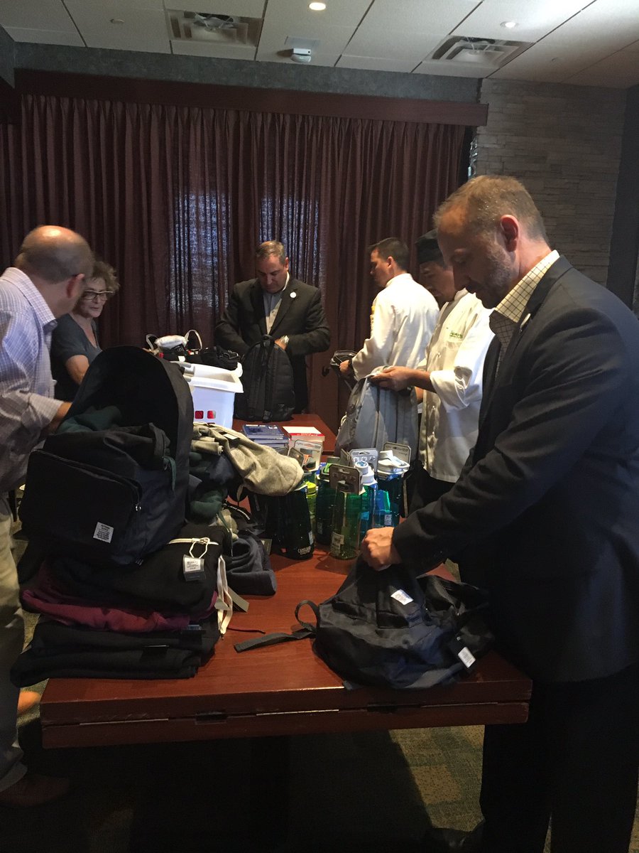 baccma's tweet photo. Members helping members! @Seasons52 stuffing backpacks for @HELPISInc to donate to children in need. #BACCstrong https://t.co/qjV0WYqibC