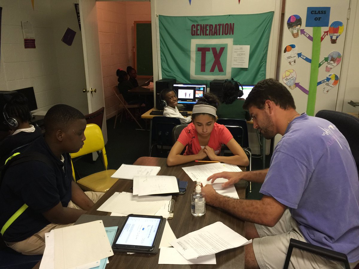 Throwback Thursday from 2016: TCT Ready, Set, Go! Center volunteer and students working on a project.  #tbt