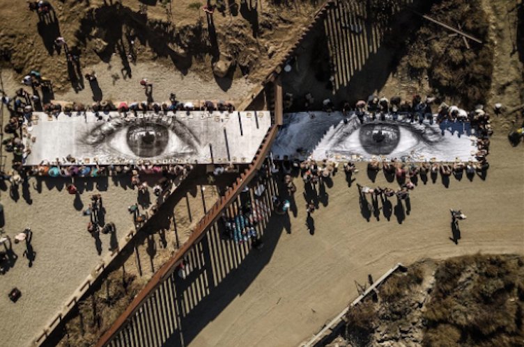 REMEZCLA's tweet photo. French Artist JR’s Latest Installation Is a Giant Picnic on the US-Mexico Border https://t.co/PsAnVD3qon https://t.co/YU98shr1F3
