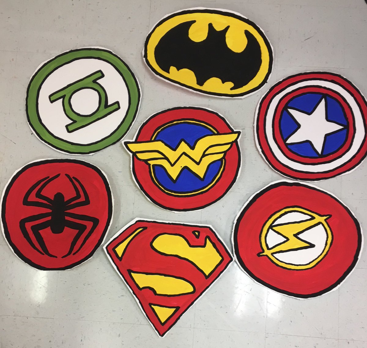 MOOsterpieces's tweet photo. Hand painted logos for our Super Hero Family Night photo op! @ReeceCubs #superhero https://t.co/qt24jLefr8