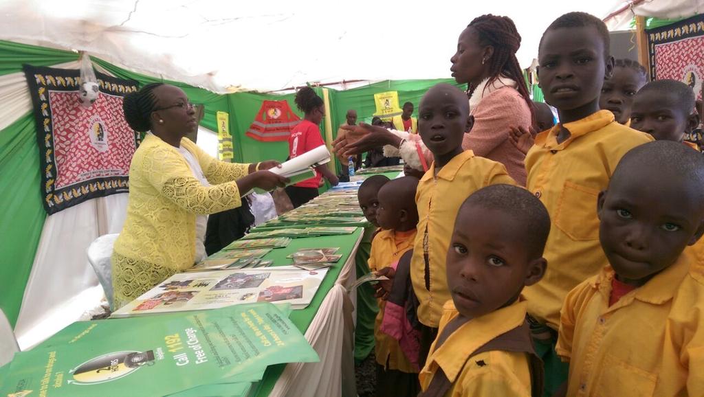 NACADAKenya's tweet photo. North Rift Regional Manager Eunice Arubia providing IEC materials to school children during Kitale ASK show @YouthFund_Ke @Ntakuka @UNODC https://t.co/Km5mTghO06