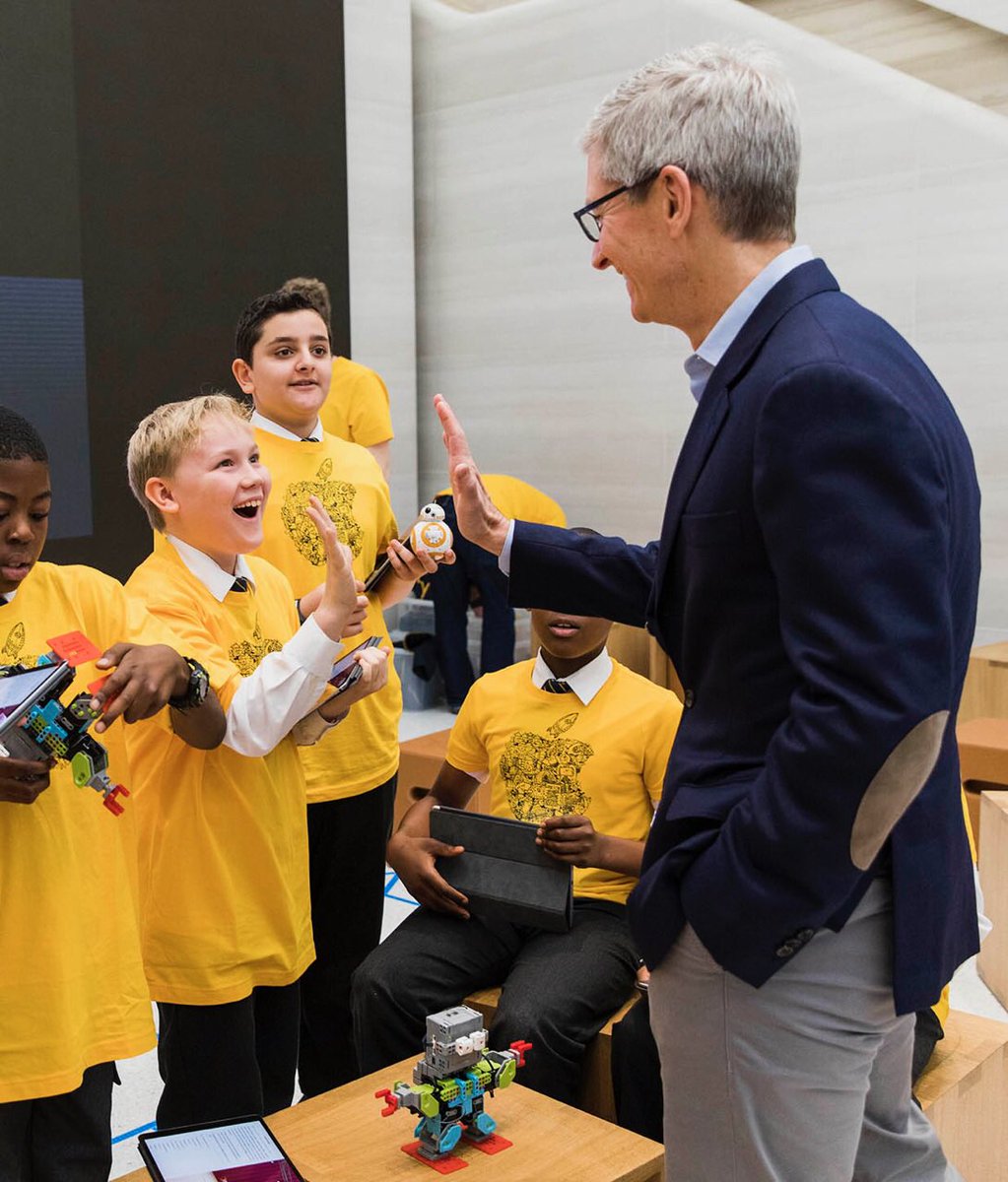 tim_cook's tweet photo. Robot dance party! 🤖 Thanks to these talented young coders from @HT_Primary. Great to meet you today at Apple Regent Street! #EUCodeWeek https://t.co/kICS4oy05c