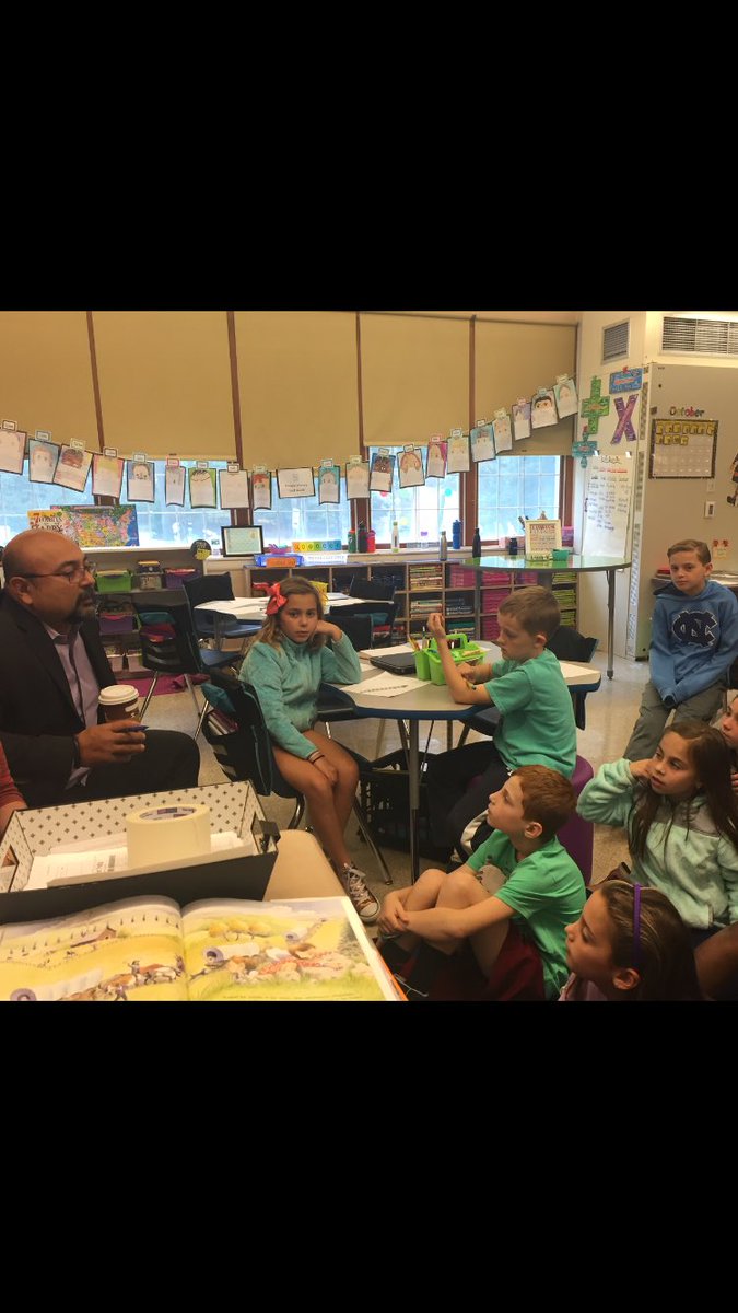CG_grade4's tweet photo. Mr. Rodas joins our class for a benchmark lesson on immigration! #bringingstoriestolife #carusorodimer102 @CenterGroveES @PrinRodas https://t.co/XPKgUdyTG3