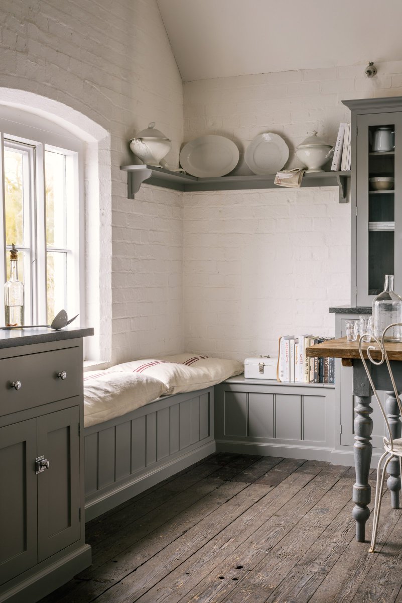 A simple window seat painted in 'Lead' grey - beauty and function all rolled into one delightful piece of furniture. #KitchenGoals #Design