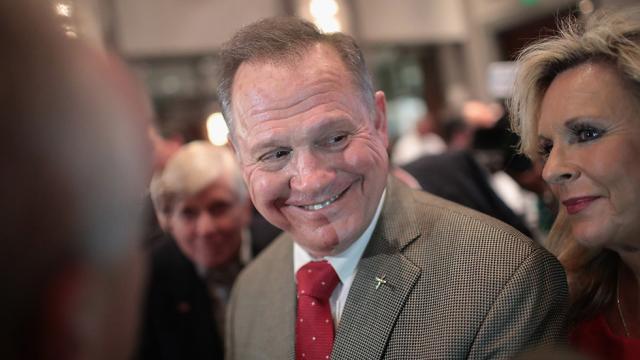thehill's tweet photo. Roy Moore received over $1 million from charity after claiming he earned no "regular salary": report https://t.co/d4tksKD88A https://t.co/jsV1KEm0UW