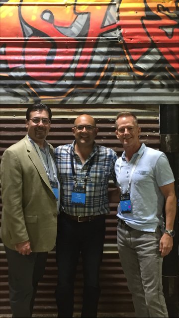 BCNTelecom1's tweet photo. BCN COO Julian Jacquez, and AT&amp;T Partner Exchange's Tim Harrod-Davis and John Lauria @crashedtoys  #PartnerExchangeSummit https://t.co/ILY6a67h4Z