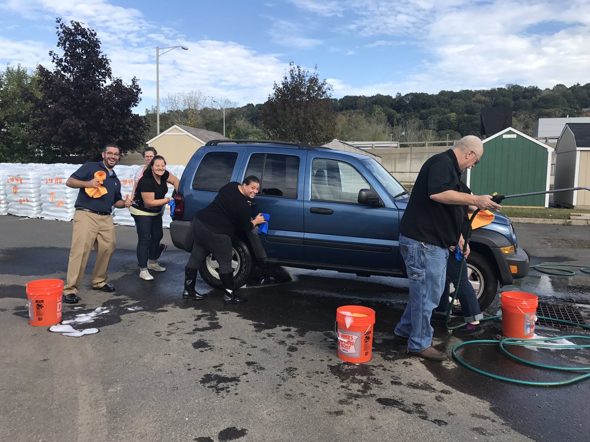 Asm's and dh's washing the cashiers cars for cam ! Servant leadership at its best !