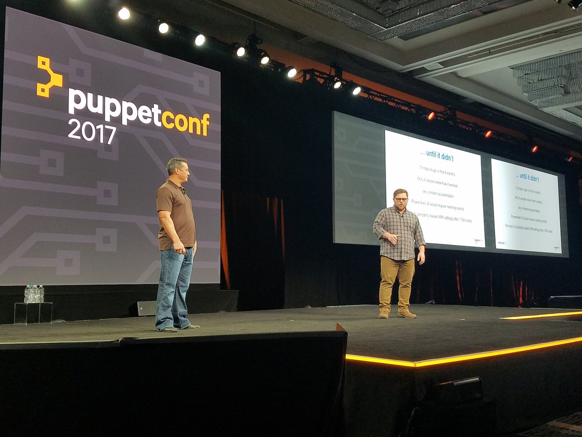 PariseauTT's tweet image. &quot;Hi, my name is Chris, and I&apos;m a recovering @Windows #GUI user.&quot; -@kittecm of @Walmart (left), presenting at #PuppetConf w/ Derek Robinson.
