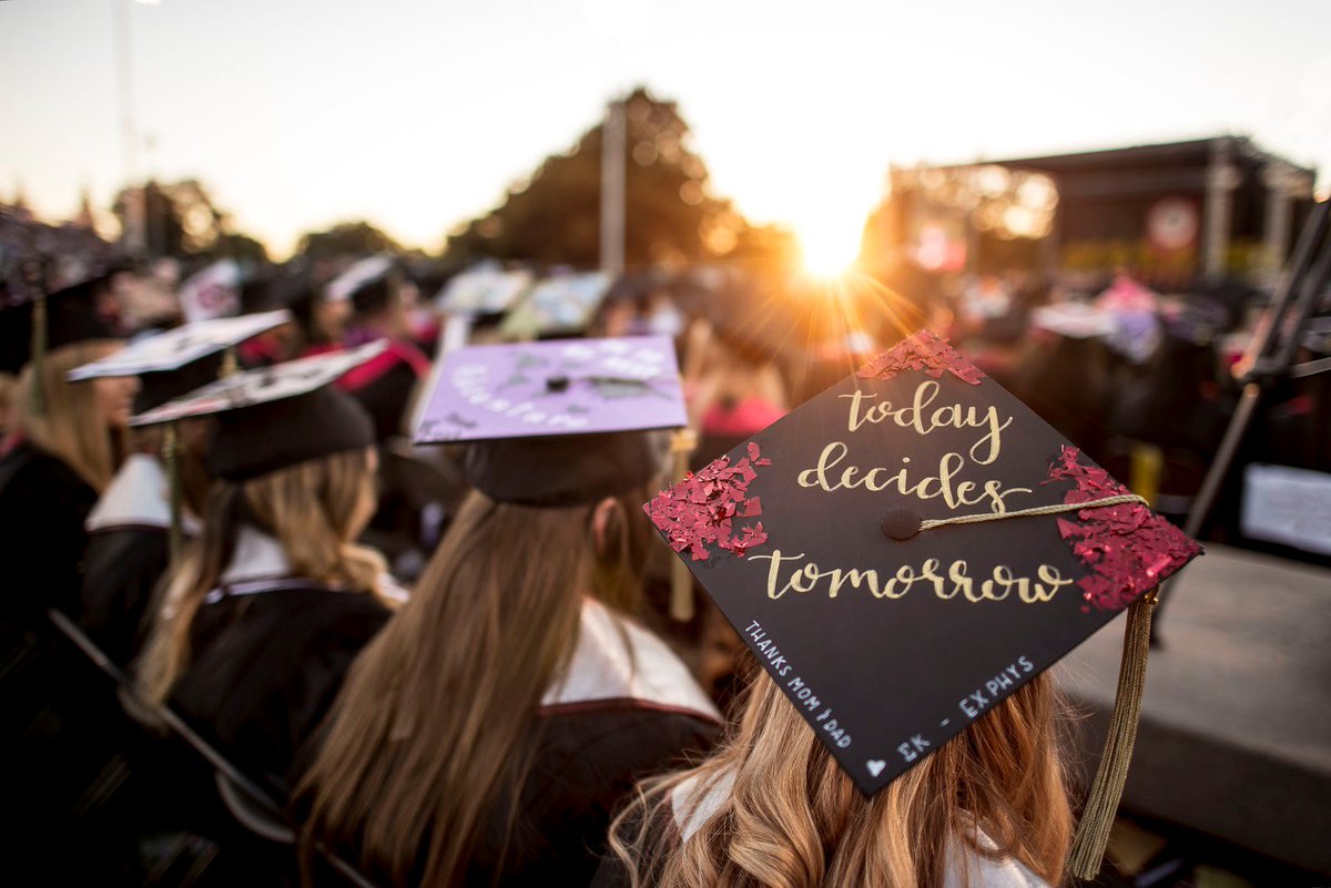 "Today decides" tomorrow is on the graduation cap of a student at commencement.