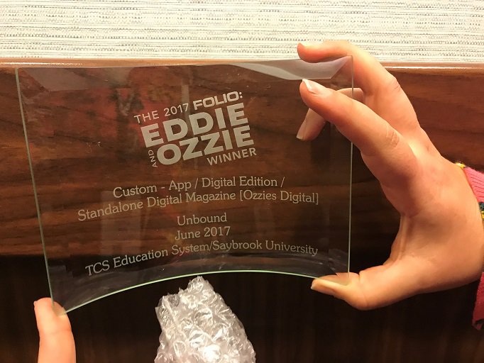 SaybrookU's tweet photo. UNBOUND is a winner at the @foliomag Eddie and Ozzie Awards! Congrats to  @TCSEdSystem Marketing dept. for the gorgeous design! #FolioAwards https://t.co/U7urNrMY9t