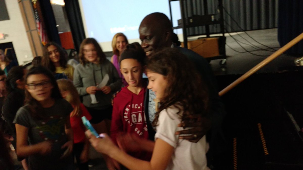 heather_flor's tweet photo. Students crowding in for a selfie with Lost Boy Abraham Nhial after his presentation at @JLSMS_Official Thanks @SudanSunrise! https://t.co/zoQR0zX35M