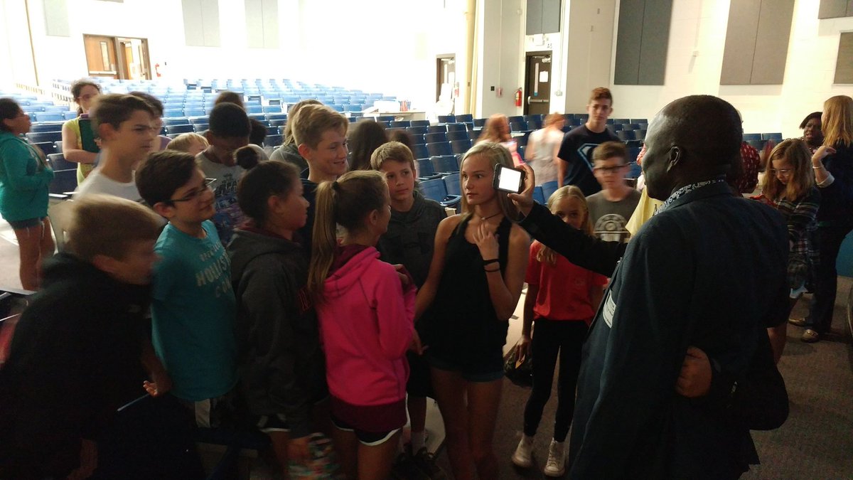 heather_flor's tweet photo. Students crowding in for a selfie with Lost Boy Abraham Nhial after his presentation at @JLSMS_Official Thanks @SudanSunrise! https://t.co/zoQR0zX35M