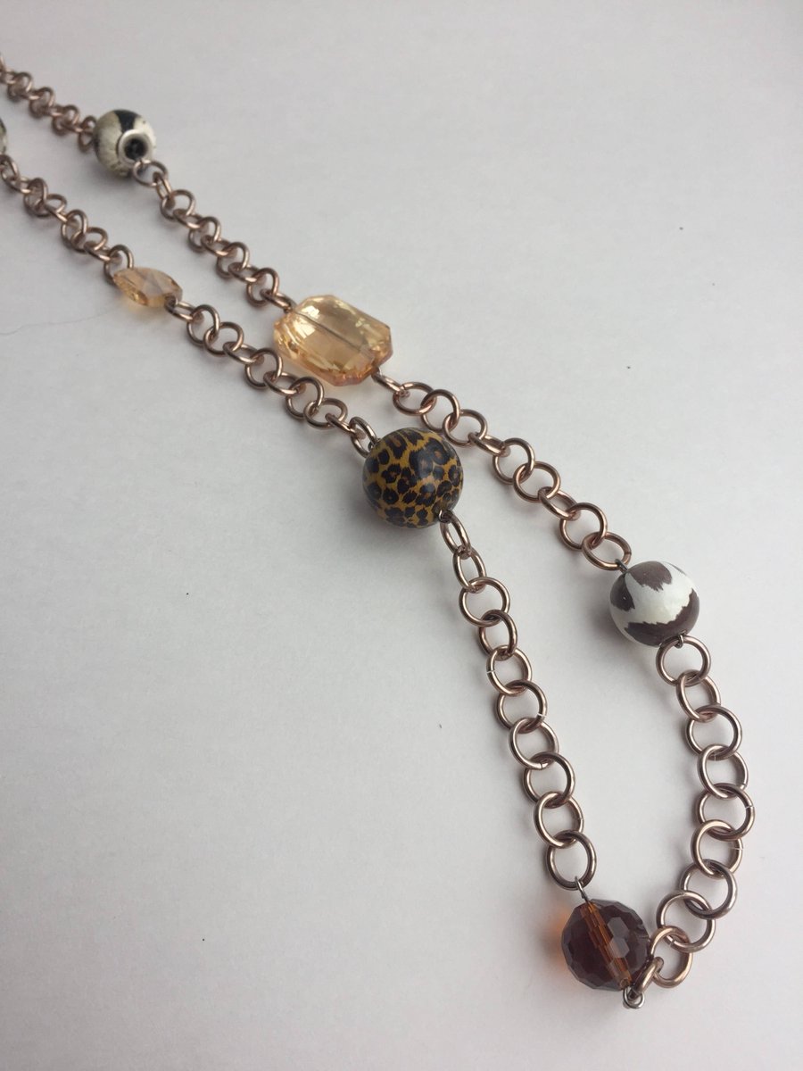randomjewelry's tweet photo. Gold and Animal Print Long Bead and Chain Necklace https://t.co/8ac8yMfUjv #handmade #Randomjewelry https://t.co/pg11iRuc7u