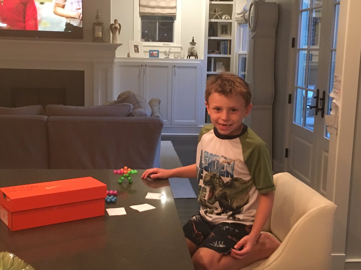 PrettyProGame's tweet image. Future #gameinventor, Aiden, is showing me his new #game creation. #toys #LittleEntrpreneur