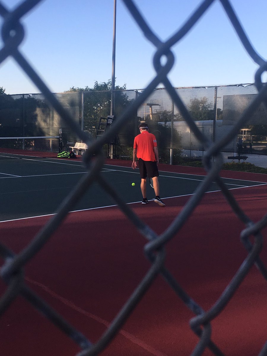 Quinn getting ready to serve in his round match.
