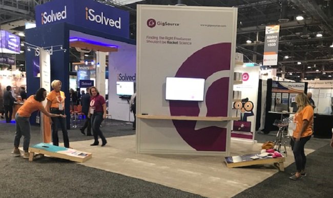 AgileOneGlobal's tweet photo. We challenge you to a game of #cornhole w/ the AgileOne and @gig_source team @HRTechConf! Meet us today at Booth #1358! https://t.co/uc1Oe58KBQ