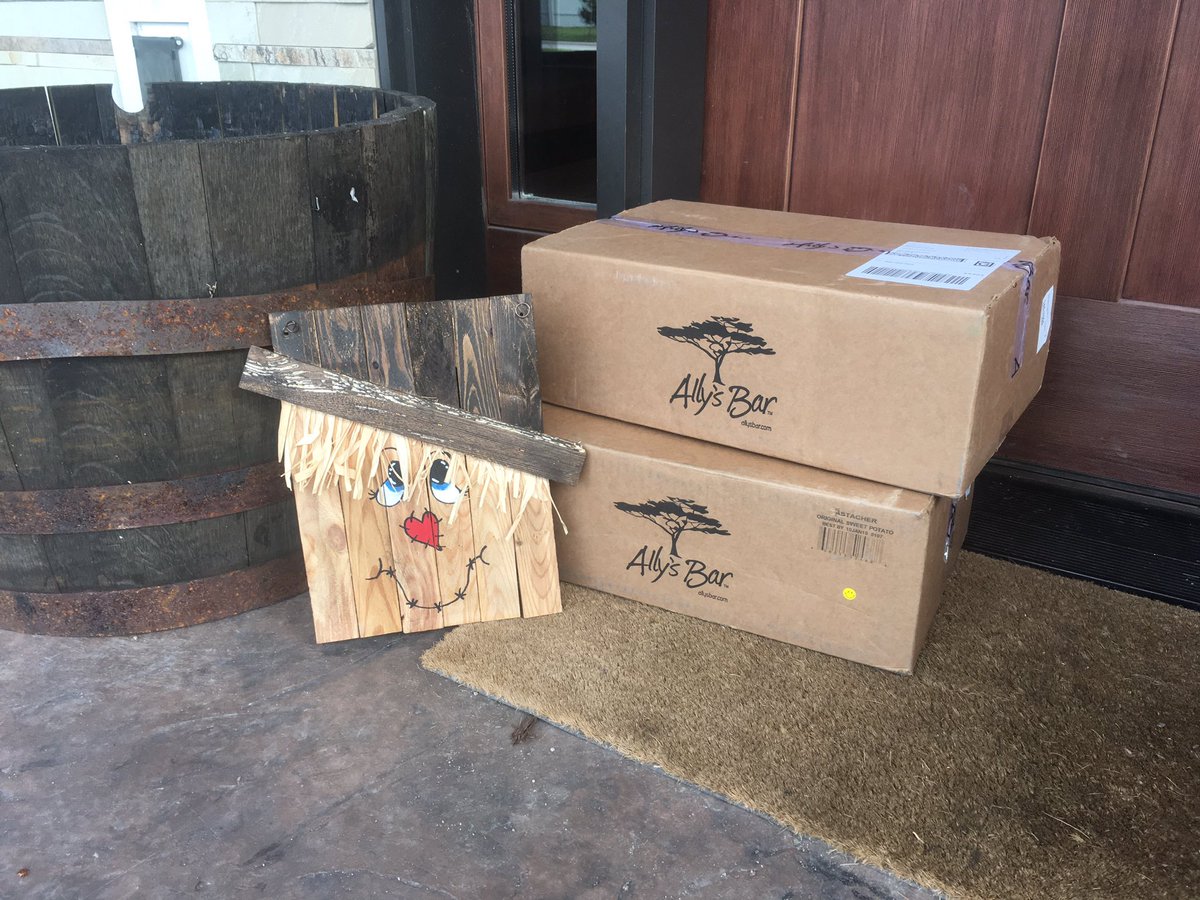 Scarecrow protecting the <a href="/allys_bar/">Ally's Bar</a> doorstep goods! October = $1 bar at allysbar.com Happy Fall All!