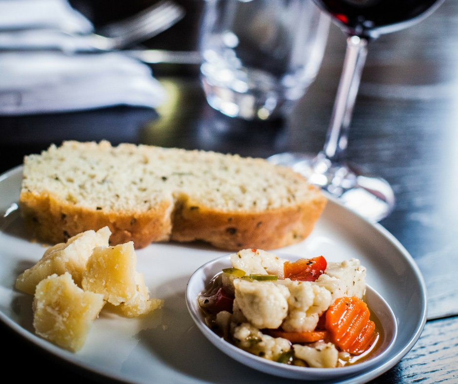 Grana Padano straight off the wheel, house-baked bread, and house-pickled veggies. That's how we like to start things off. | #PortlandMaine