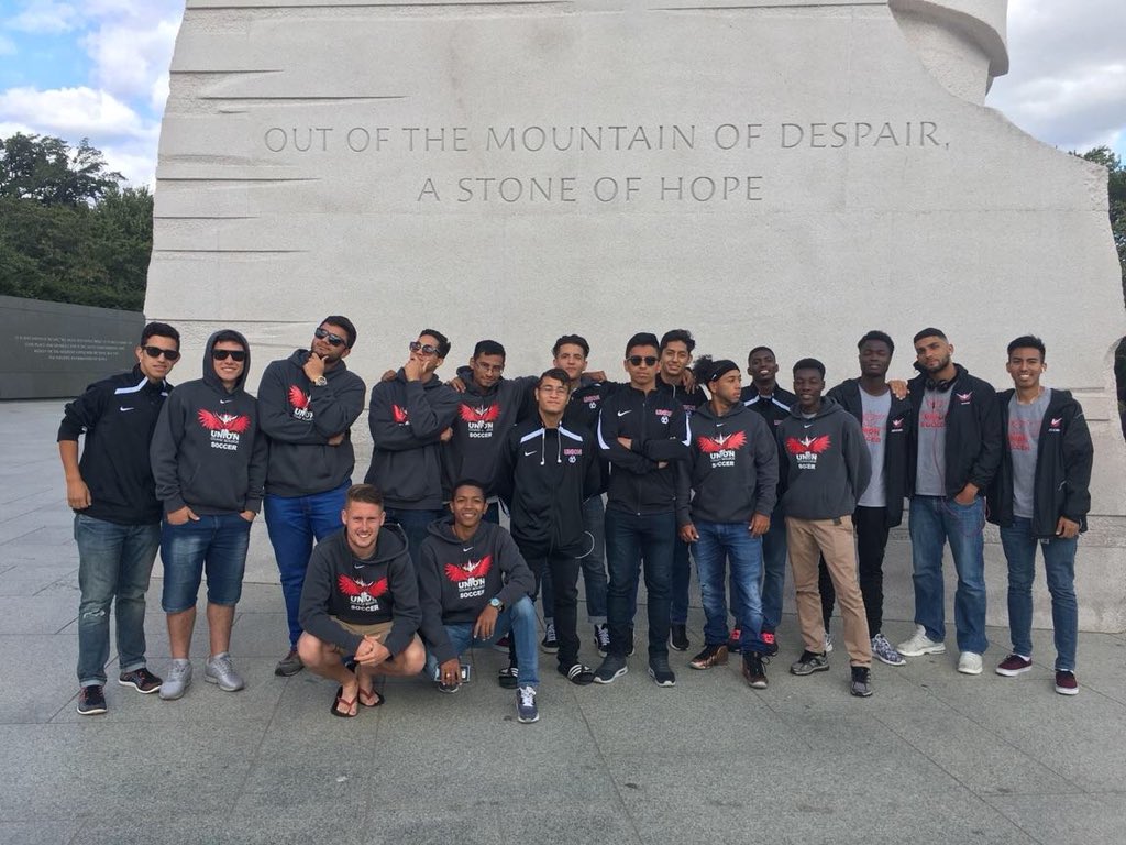UnionOwls's tweet photo. Our Men’s soccer team  playing #Nova in Washington DC tomorrow. Here they are posing in front of a phenomanal quote #WeAreOwlStrong #UCC https://t.co/dLEOhnr4HU