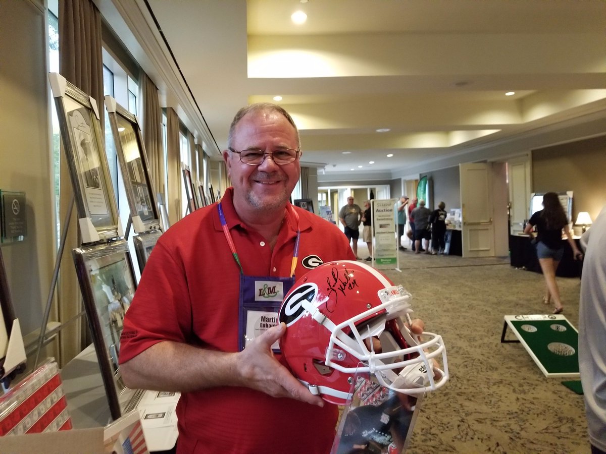 WTFCF_TV's tweet photo. Martin Eubanks made off with a signed Herschel Walker helmet at the SEPC auction for Irma.  #southerninnovations @producecouncil https://t.co/dxJarE2ozq