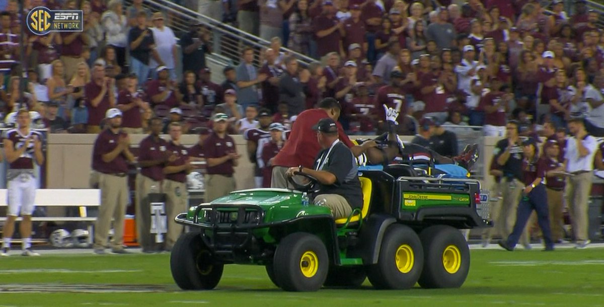 SECNetwork's tweet photo. South Carolina's Terry Googer bravely gives a thumbs up to the crowd as he's carted off the field.

Our prayers are with him. https://t.co/hOucgxLfWS