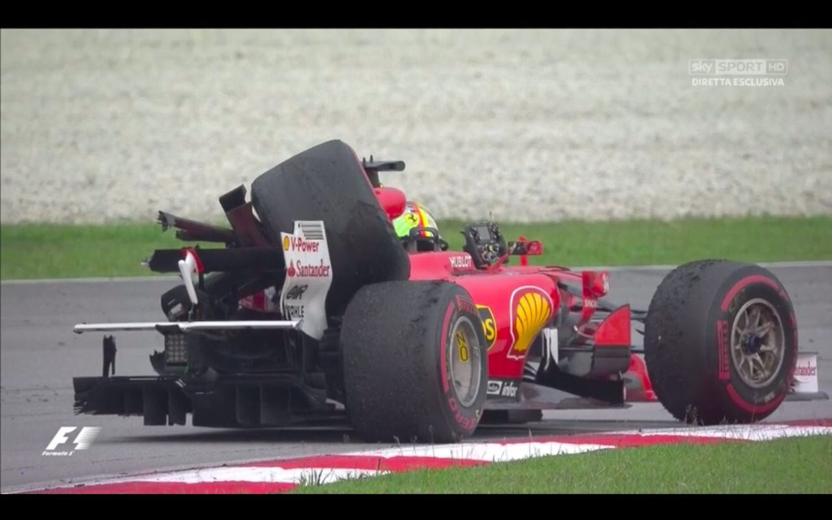 AxisOfOversteer's tweet photo. You can’t say Vettel didn’t  drive the wheels off his Ferrari today... 😀 https://t.co/pxXQWXdGE2