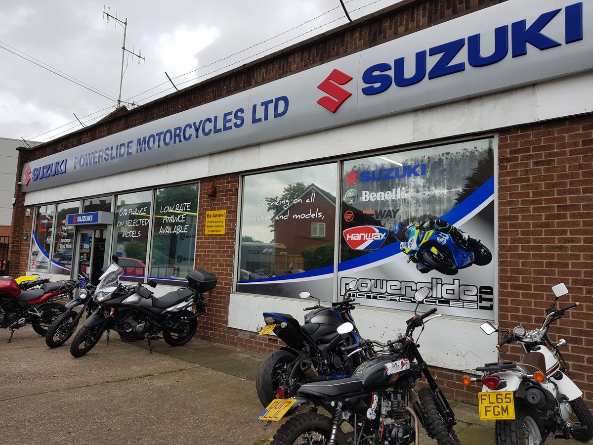 Big job done yesterday... powerslide motorcycles window graphics to make the shop pop a little more.