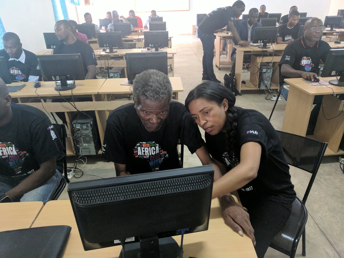 mHubMW's tweet photo. It is not too old to learn to code! Theresa Felino from @ScienceCentreCT helps one of the teachers #AfricaCodeWeek2017 https://t.co/MnwodTpPHO
