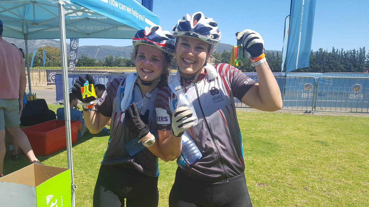 Our third ladies team <a href="/LouwKristen/">Kristen Louw</a> and <a href="/NicoleneMarais3/">Nicolene Marais</a> loving their <a href="/Nederburg/">Nederburg Wines</a> water bottles and <a href="/Qhubeka/">Qhubeka Charity</a> bells! #VarsityMTB