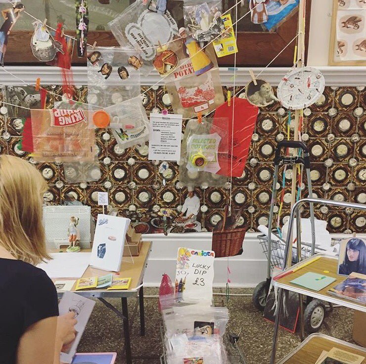 Our set-up has been evolving during 3 days of #FOMOjoy. We've enjoyed playing with our display &amp; adding bits to our strung collage <a href="/FOMOJOY/">#writing = #arting</a>