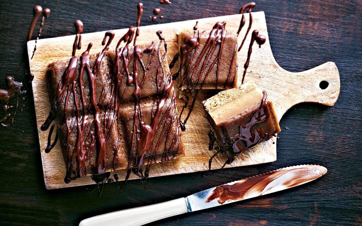 Our weekend treat is <a href="/Telegraph/">The Telegraph</a>'s moist coffee cake drizzled in melted chocolate. It is #InternationalCoffeeDay! bit.ly/2xKwfvw
