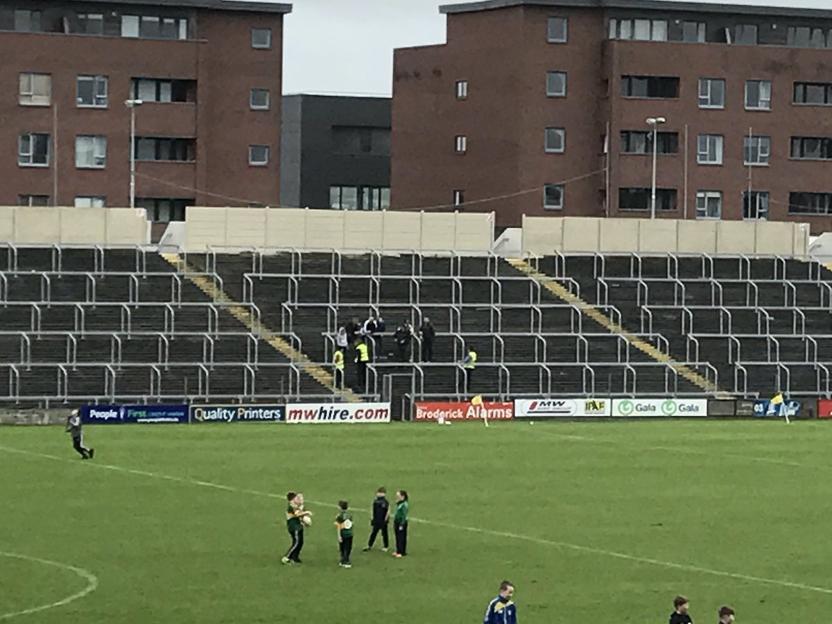 gkeogh99's tweet photo. Three @LaoisGAA1 stewards trying to remove 7 supporters from the terrace in @PortlaoiseGAA v @Graiguegaa match. #calltheguards https://t.co/f804E9aPbL